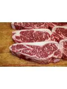     Discover the incredible tenderness of our Wagyu Strip Steaks.