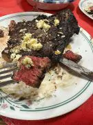 certified angus beef ribeyes cooked to perfection and enjoying a great steak.